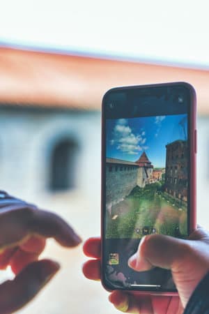 Taking a photo on a smartphone while traveling. Fortress Oreshek