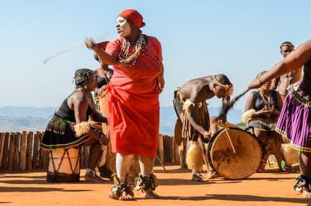 Zulu cultural experience, dressed in traditional gearZulu dressed in traditional gear dancing. Valley of a Thousand Hills, South Africa